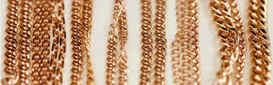 Inch of Gold chains by the inch on white background